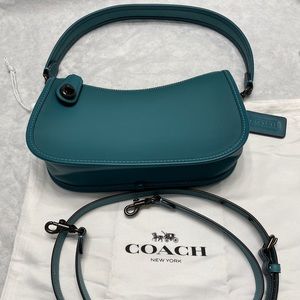 Coach leather teal colored swinger bag